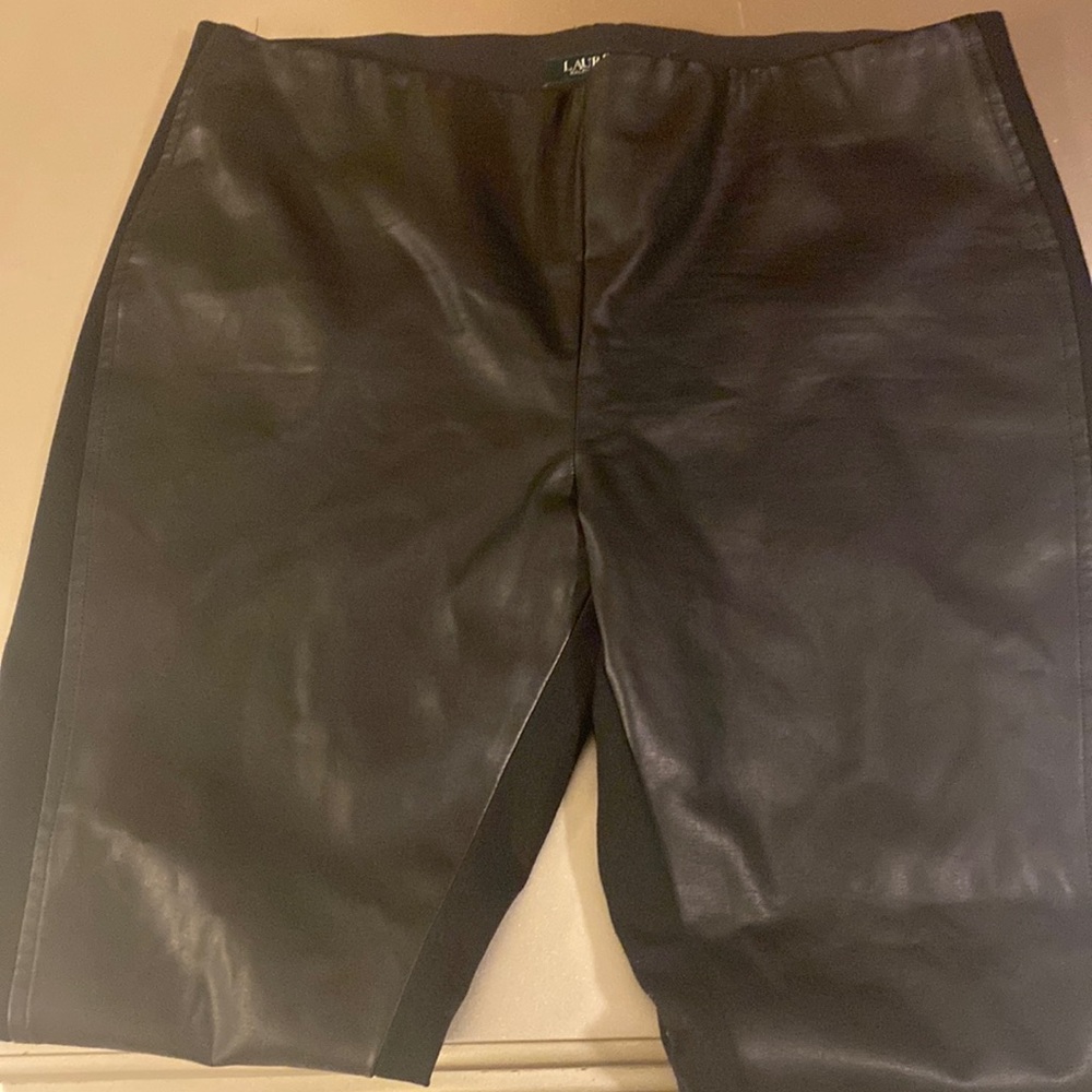 Leather in front stretch fitting pants. Size 14 black
